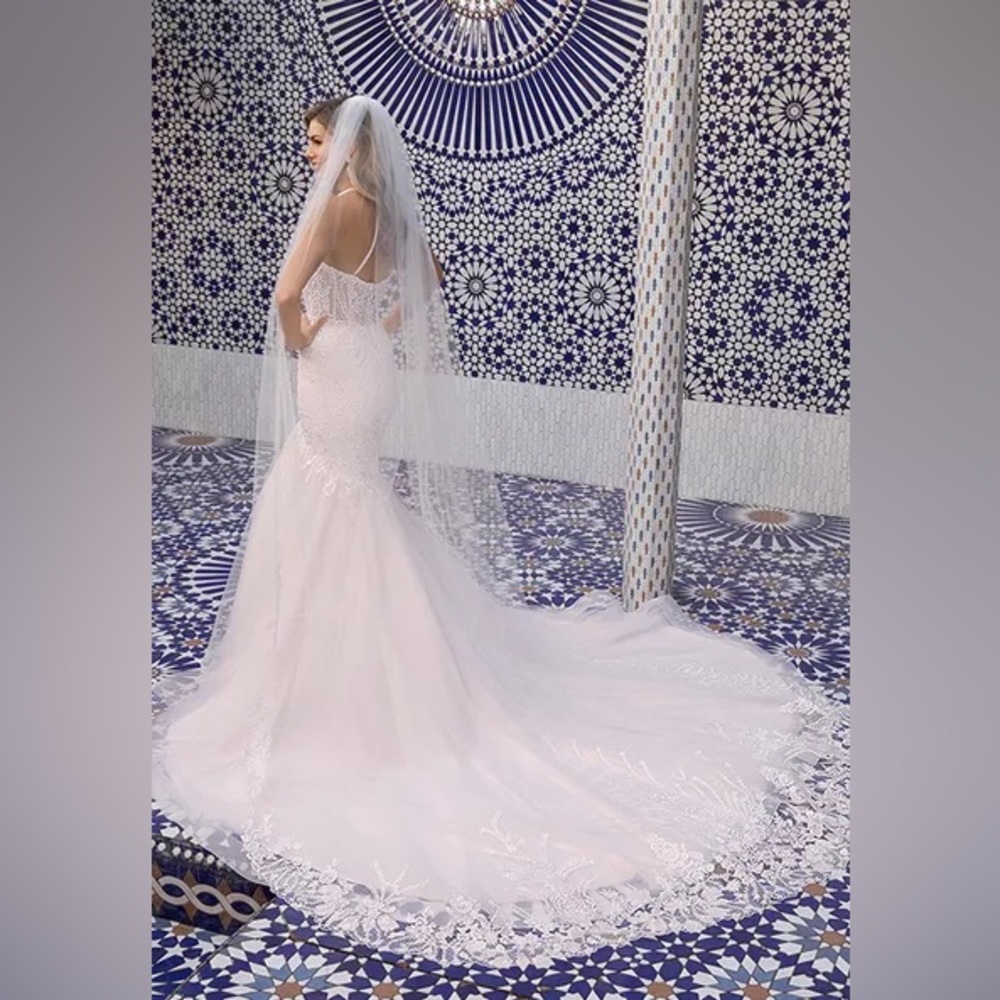 Ivory wedding dress. Beloved by Casablanca.